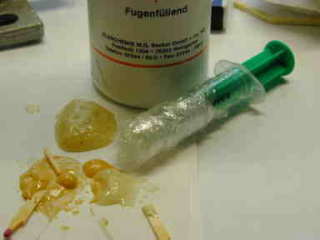 Apply PLPremium with a syringe